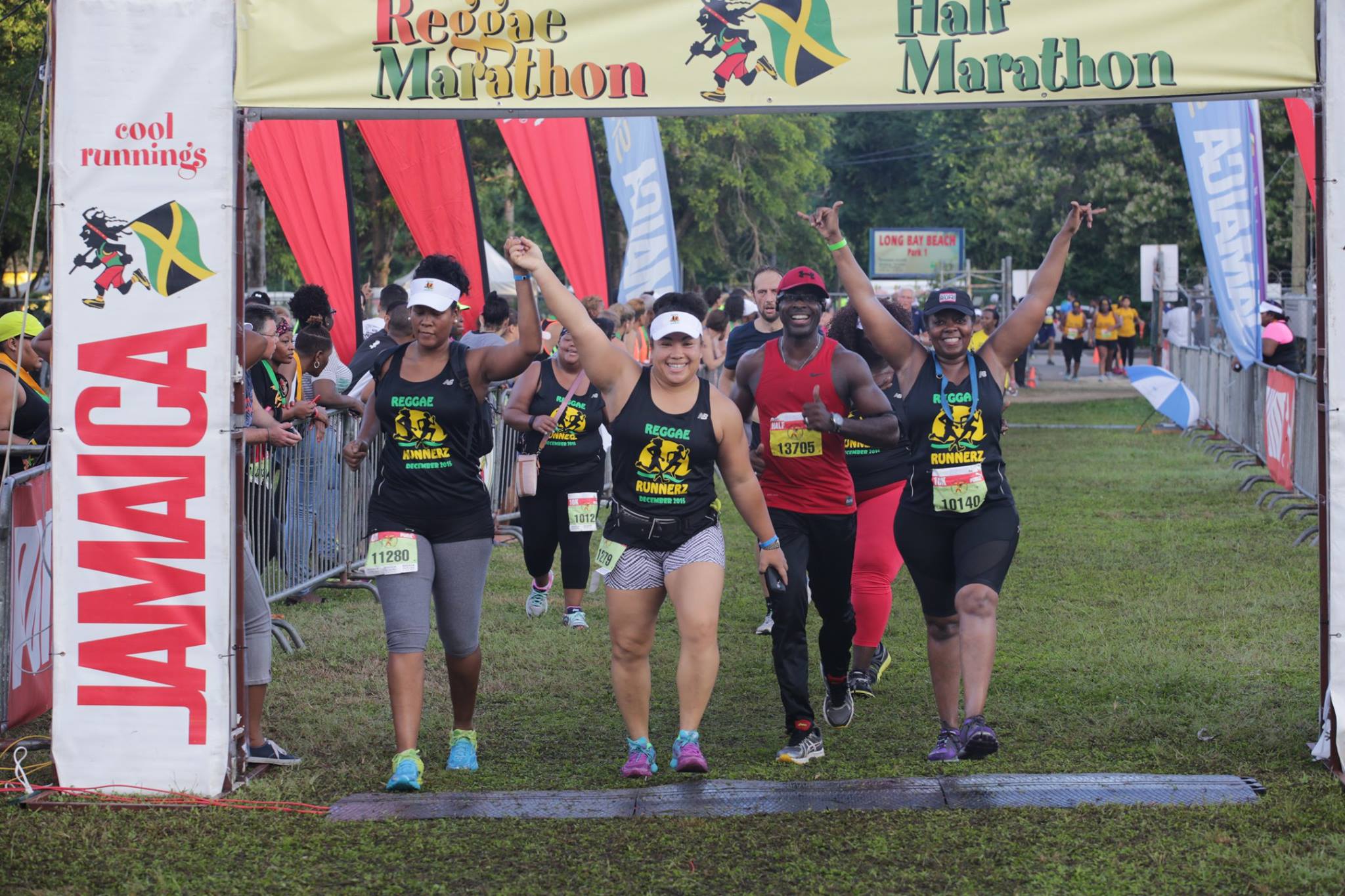 A group of people running in the park