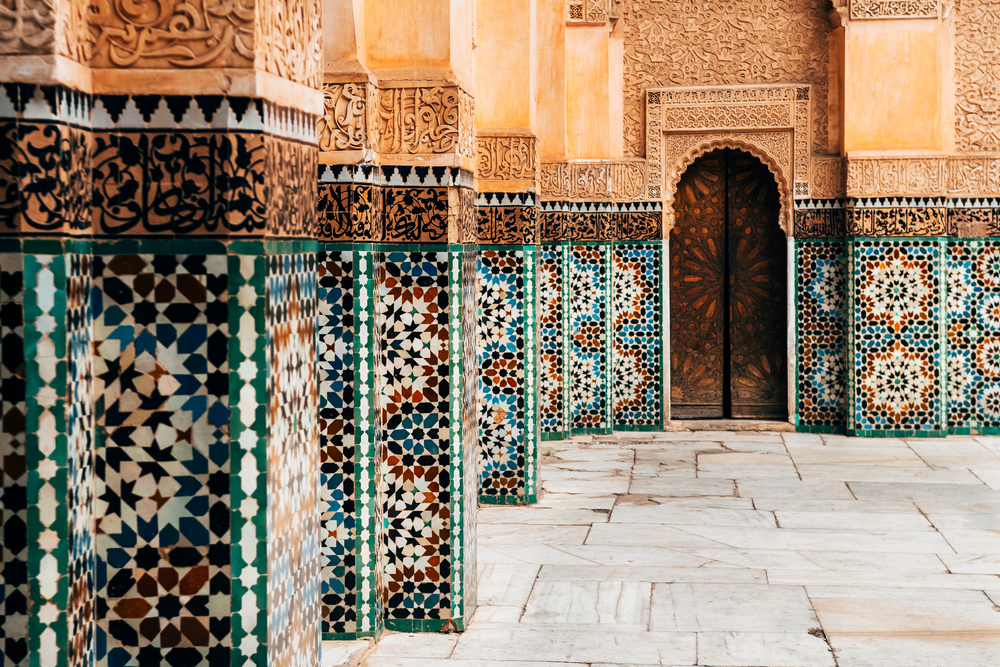 A colorful wall with many different patterns on it