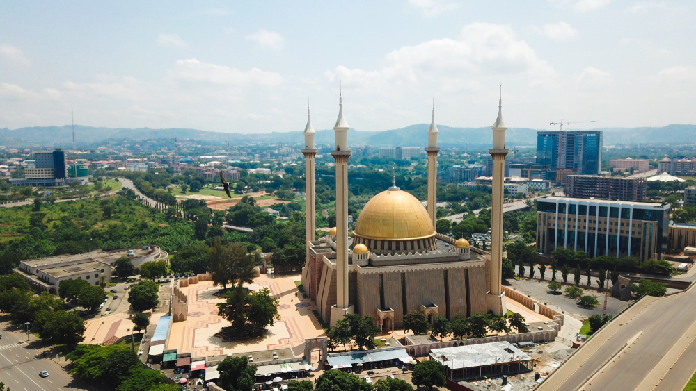 A large mosque with many domes and spires.